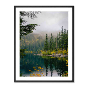 Framed photography print of a tranquil lake surrounded by evergreen trees and misty hills, capturing the serene natural beauty of Mason Lake, Washington.